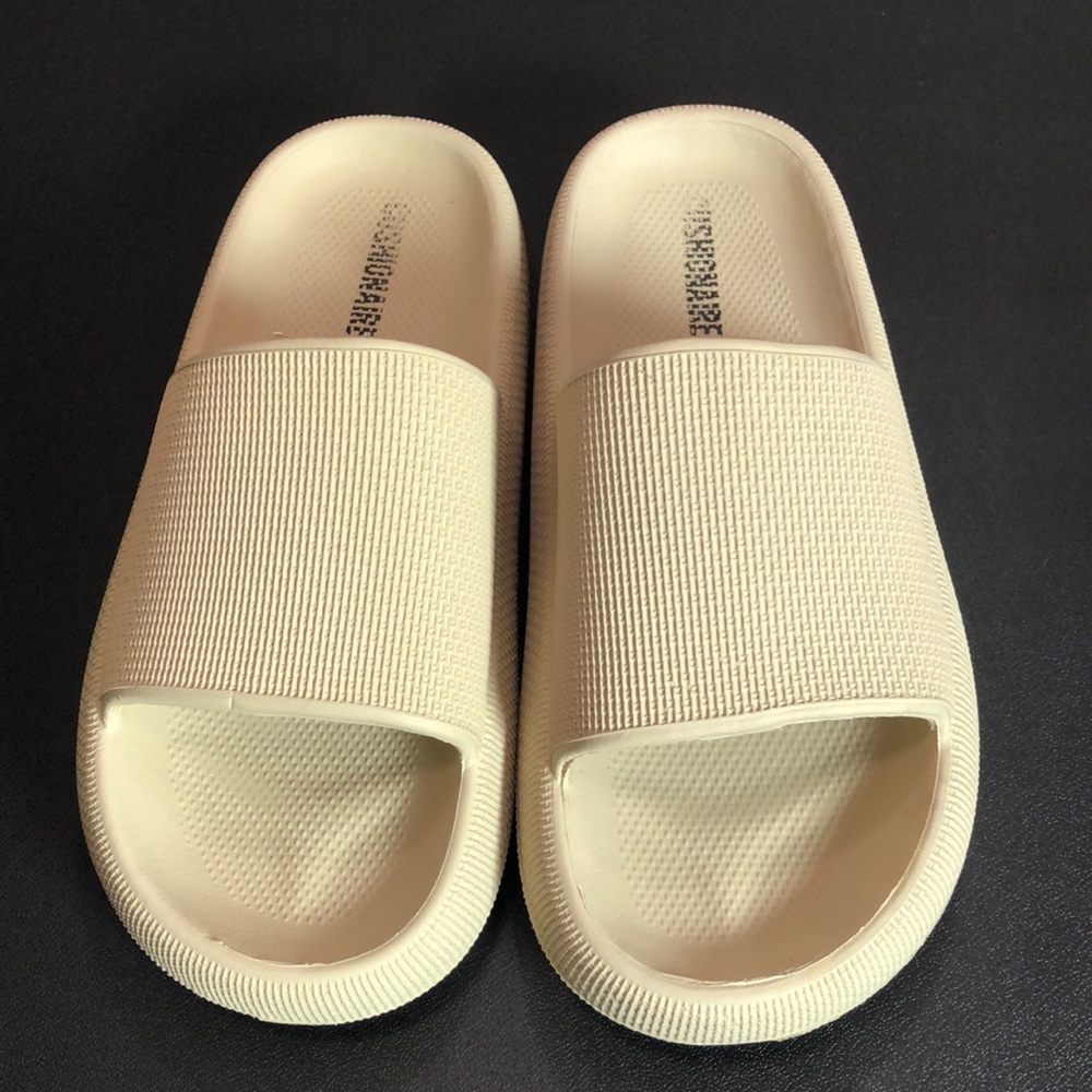 CUSHIONAIRE Feather cloud recovery slide sandals with +Comfort. 9
